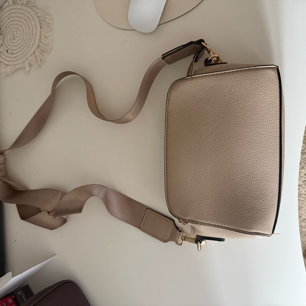 Sleek Pebble Leather Crossbody Bag in Beige